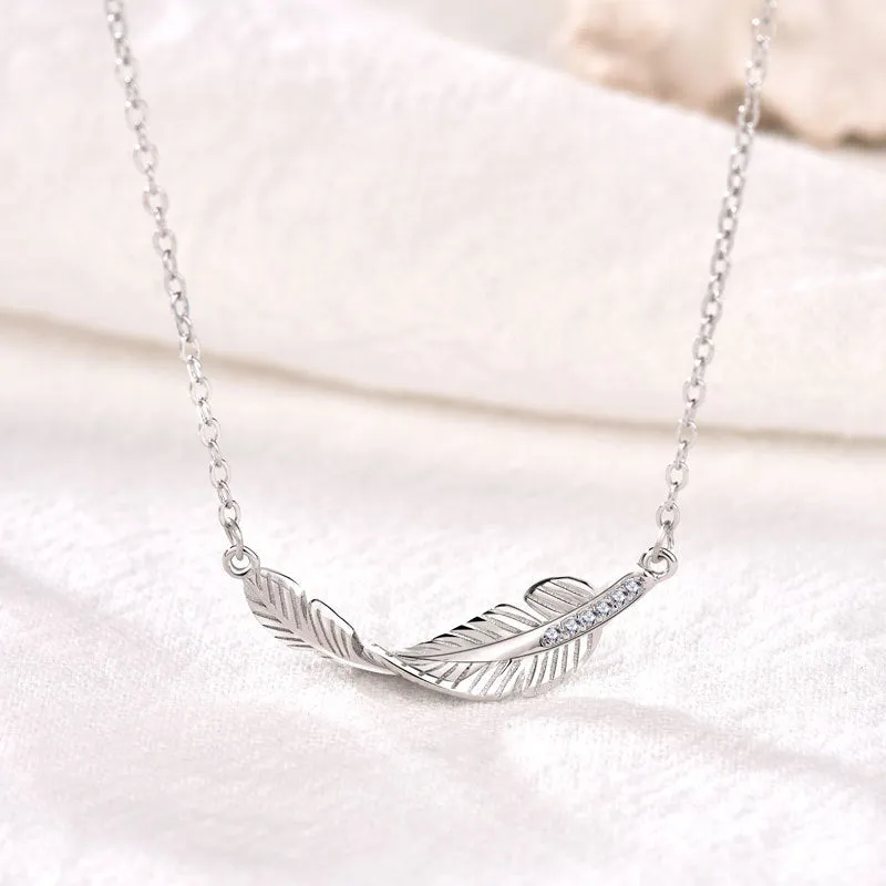 Christmas Gift Turning Feather Pendant Necklace