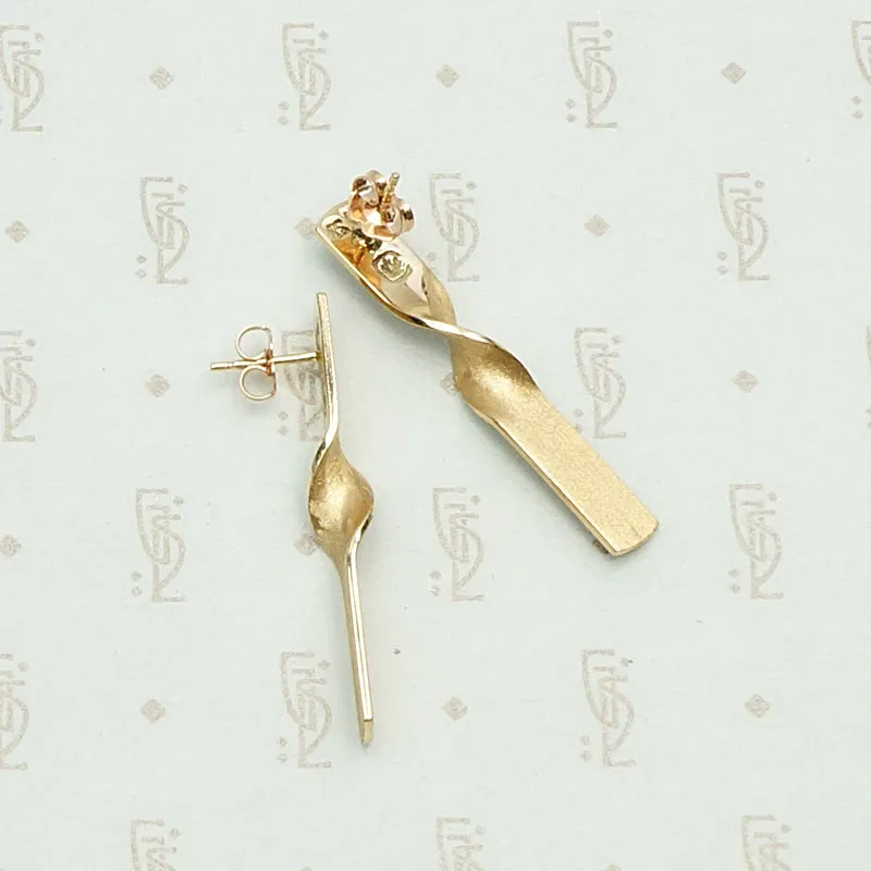 Elegant and Edgy Twisted Gold Bar Earrings