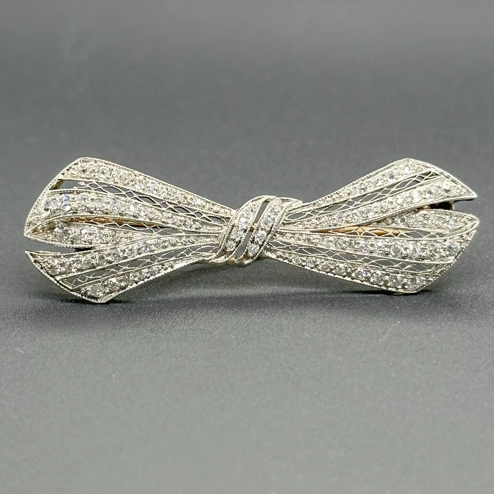 Estate Edwardian Platinum 1.56cttw G-H/SI1-2 Diamond Bow Pin