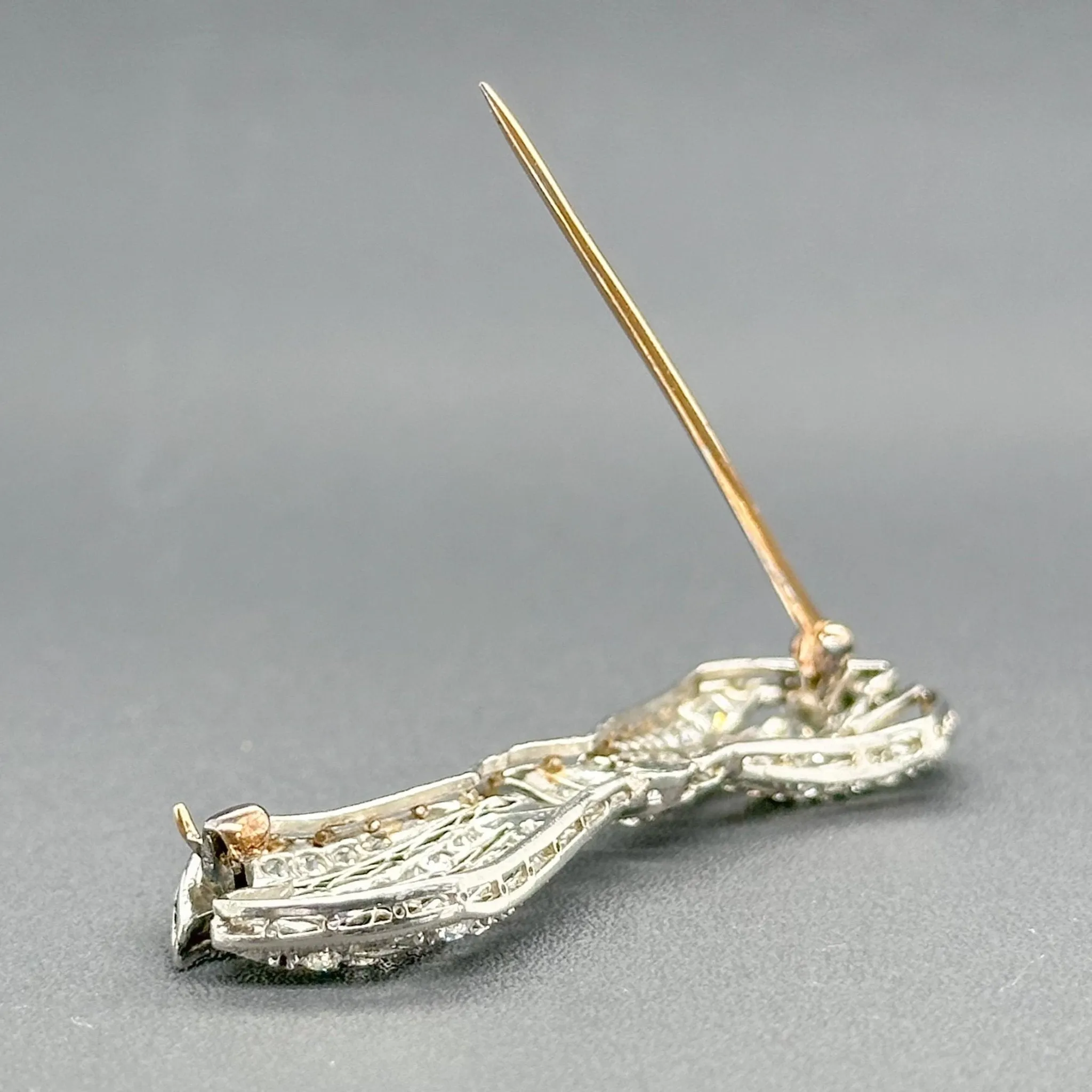 Estate Edwardian Platinum 1.56cttw G-H/SI1-2 Diamond Bow Pin