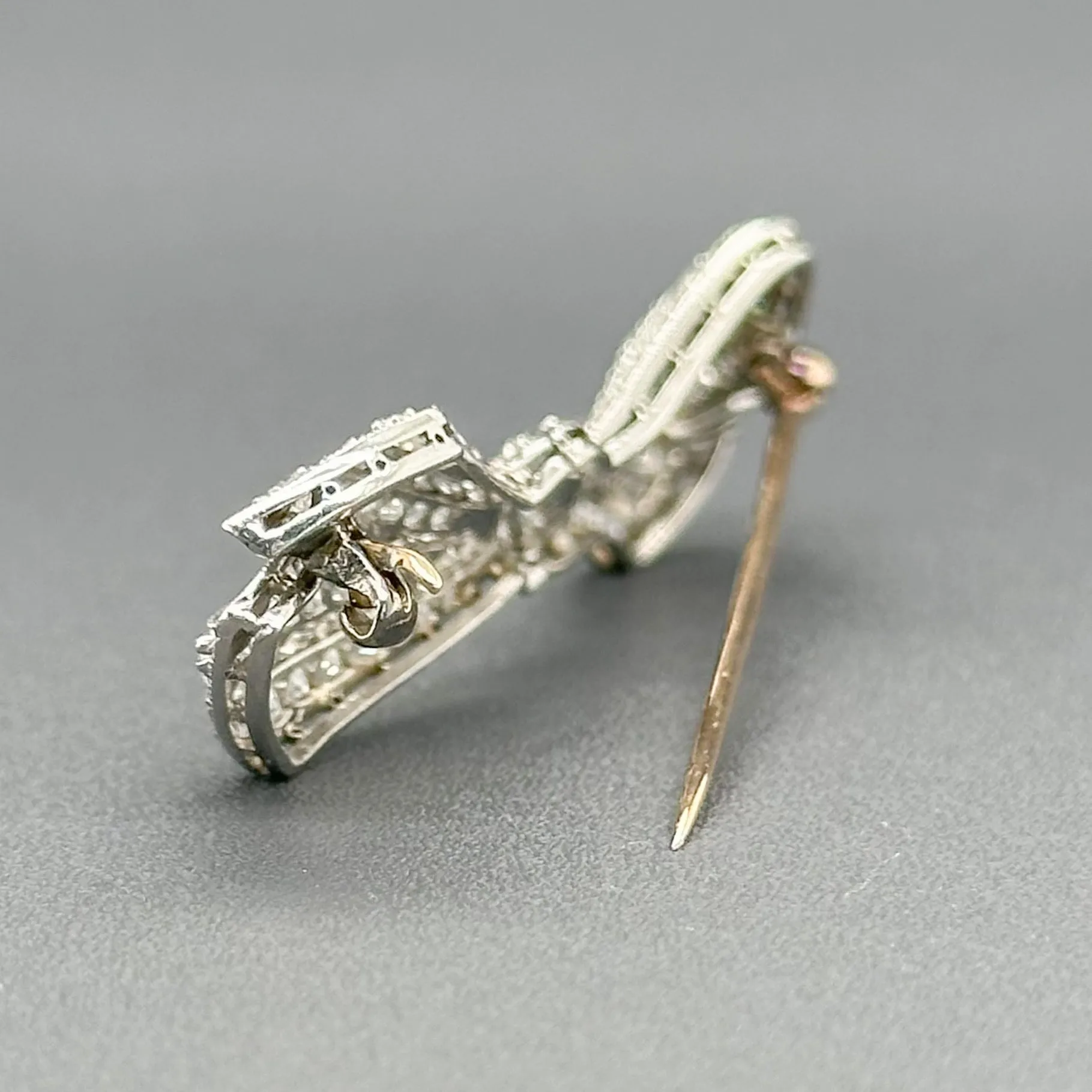 Estate Edwardian Platinum 1.56cttw G-H/SI1-2 Diamond Bow Pin