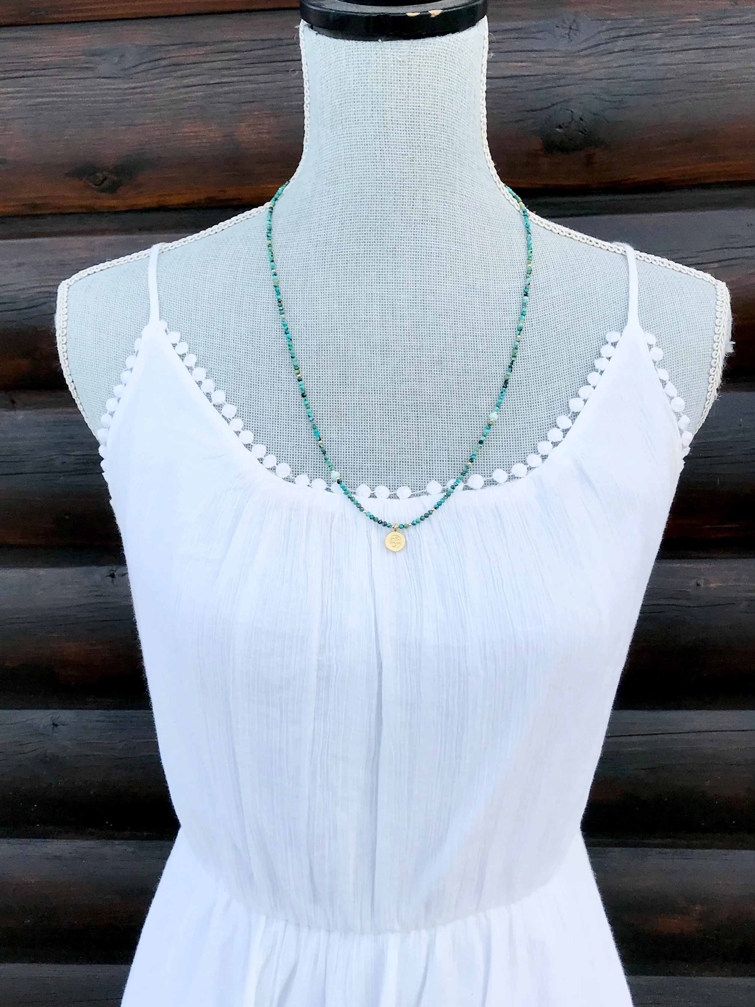 Gold Om Charm Turquoise Necklace