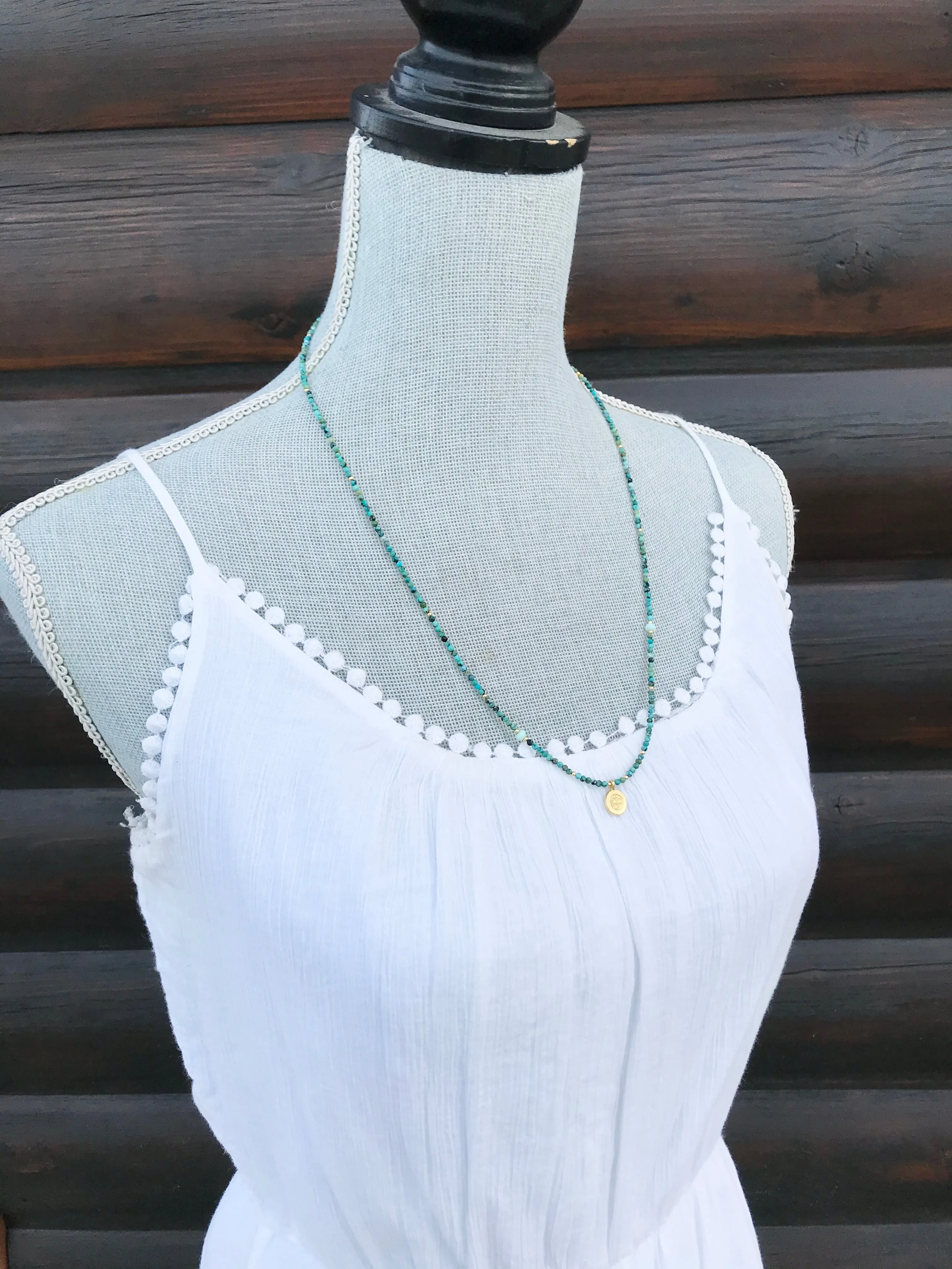 Gold Om Charm Turquoise Necklace