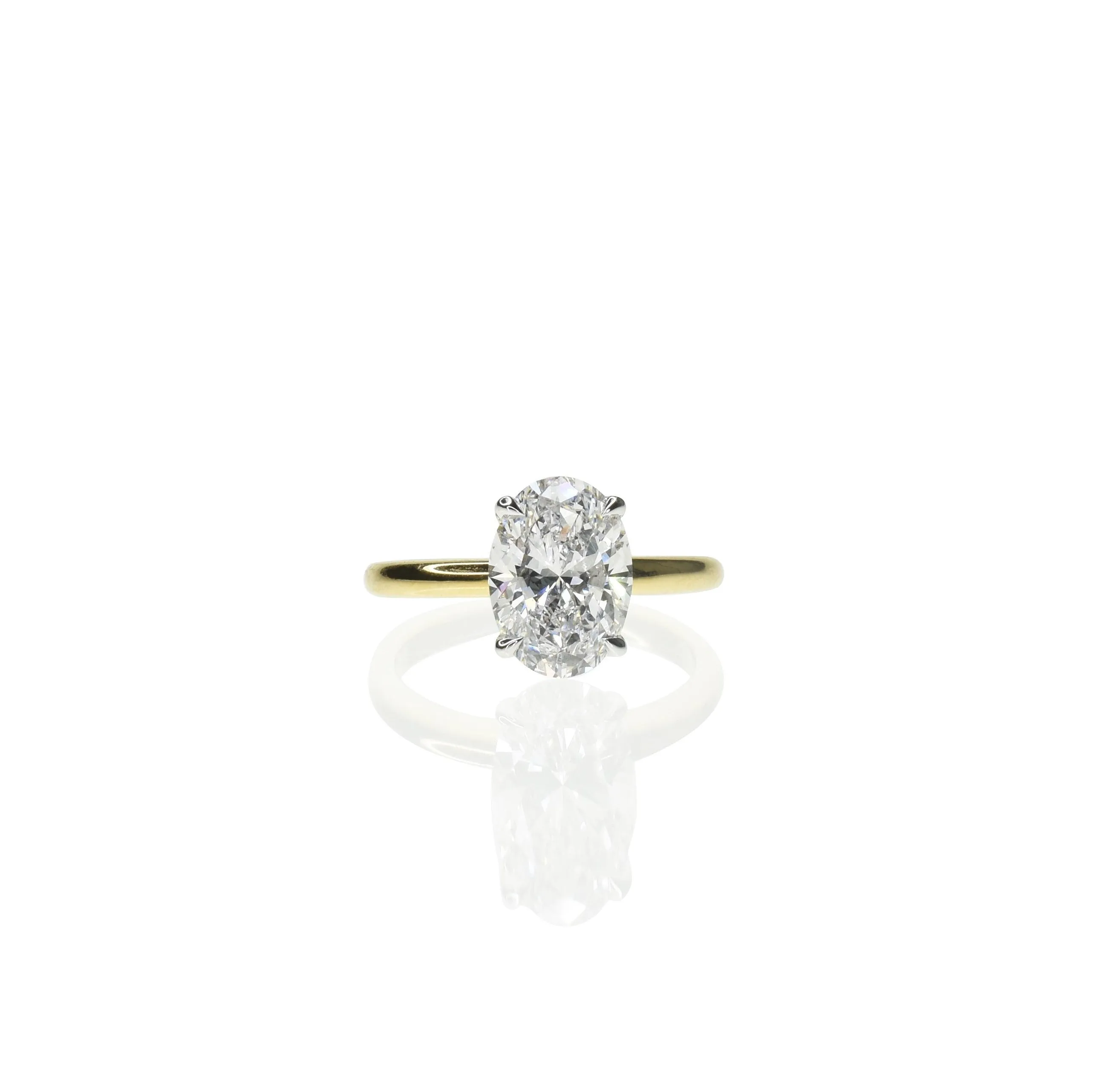 Oval Diamond with Thin Gold Band